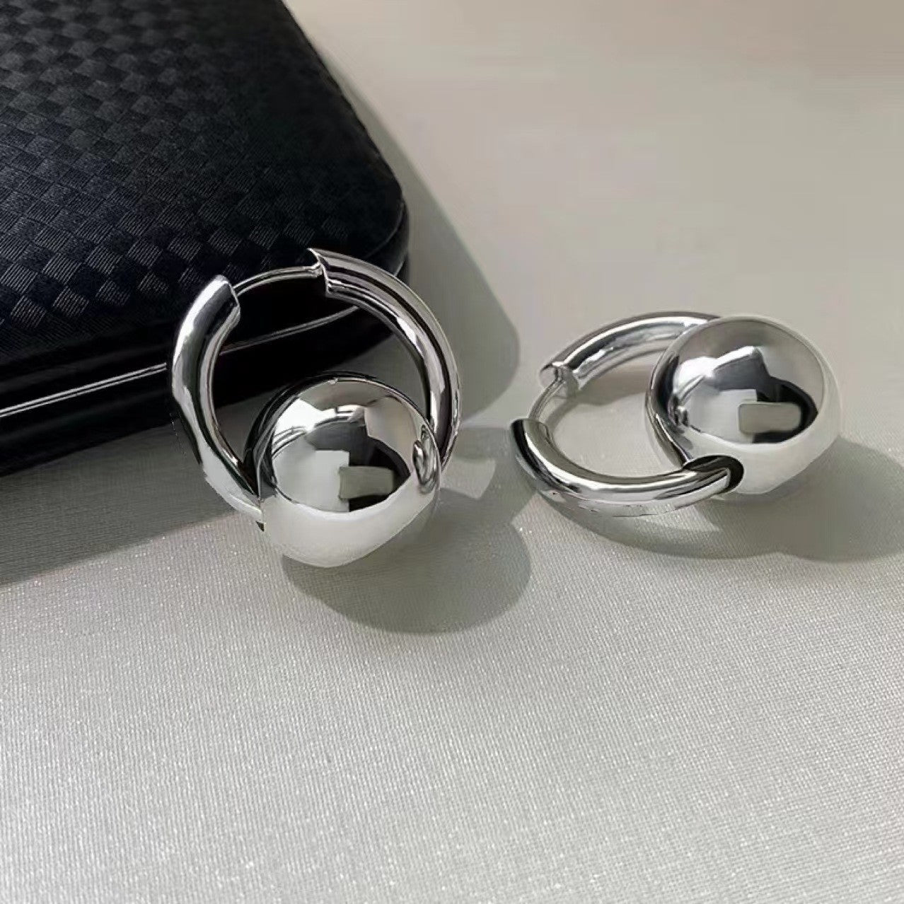Sleek Round Ball Ear Clips In A Cool Western-style Design