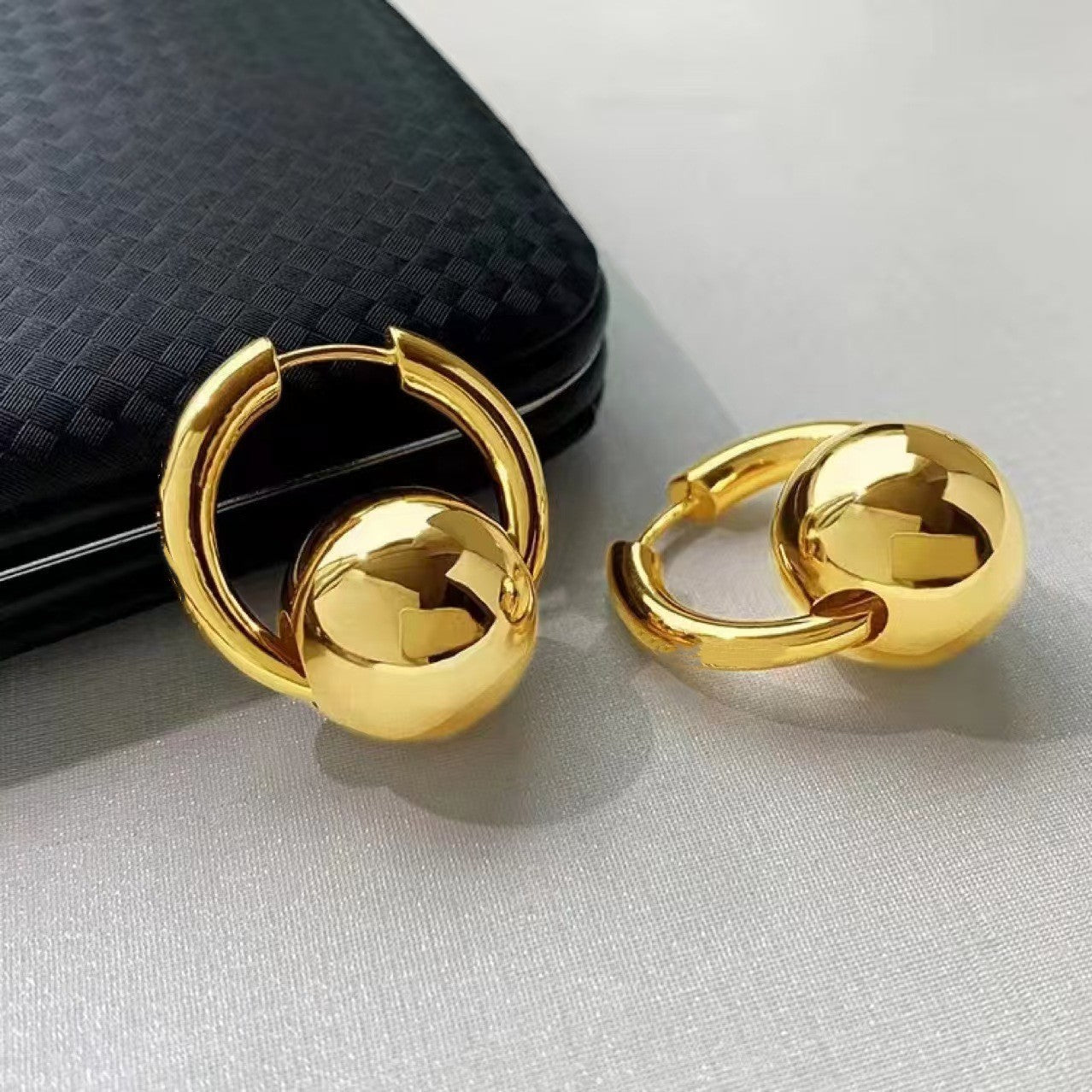 Sleek Round Ball Ear Clips In A Cool Western-style Design