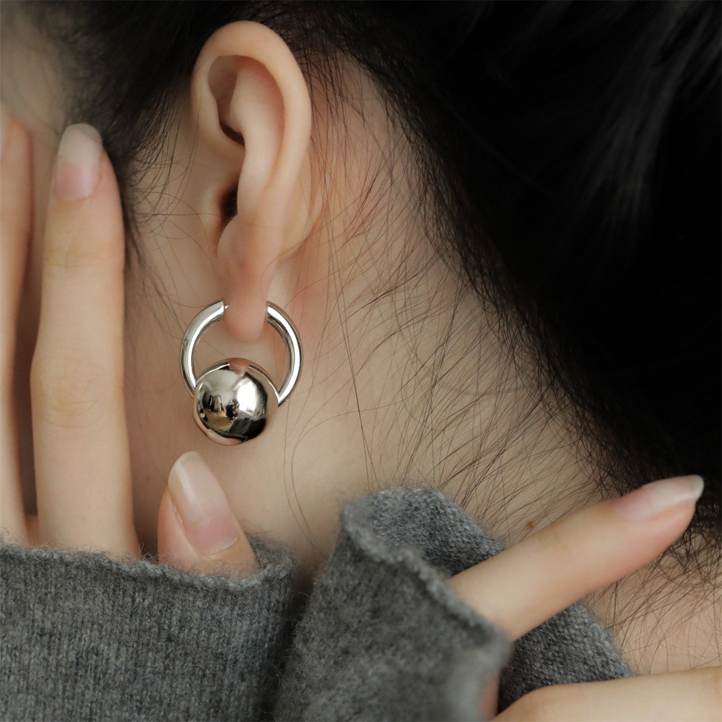 Sleek Round Ball Ear Clips In A Cool Western-style Design