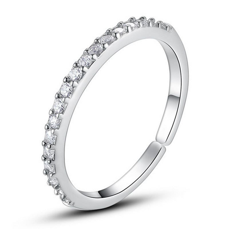 A Single-row Diamond-studded Zircon Micro-pave Open Ring