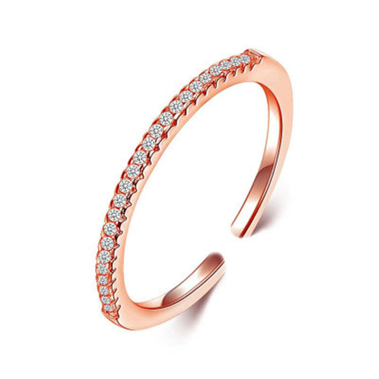 A Single-row Diamond-studded Zircon Micro-pave Open Ring